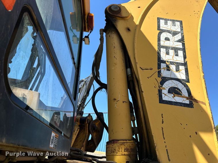 image for item EJ4879 1998 John Deere 310SE backhoe