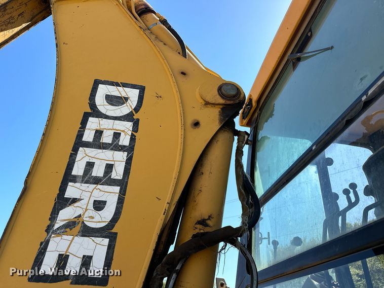 image for item EJ4879 1998 John Deere 310SE backhoe