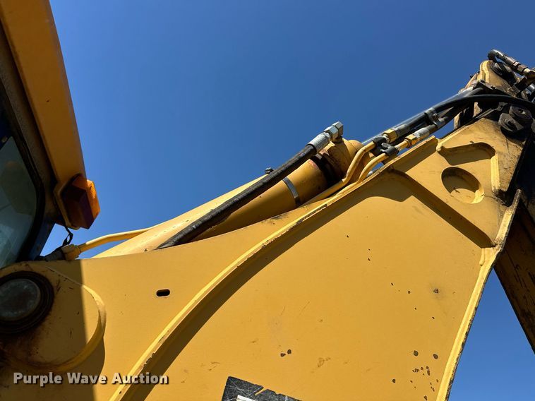 image for item EJ4879 1998 John Deere 310SE backhoe