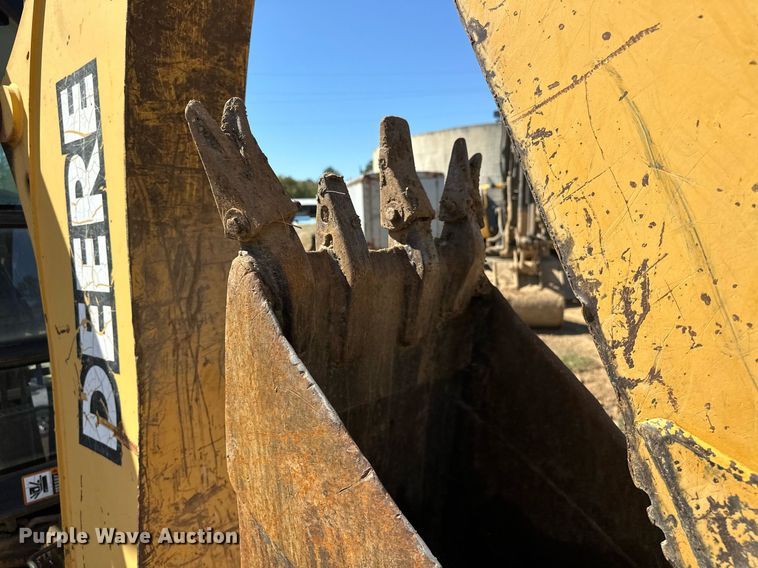 image for item EJ4879 1998 John Deere 310SE backhoe