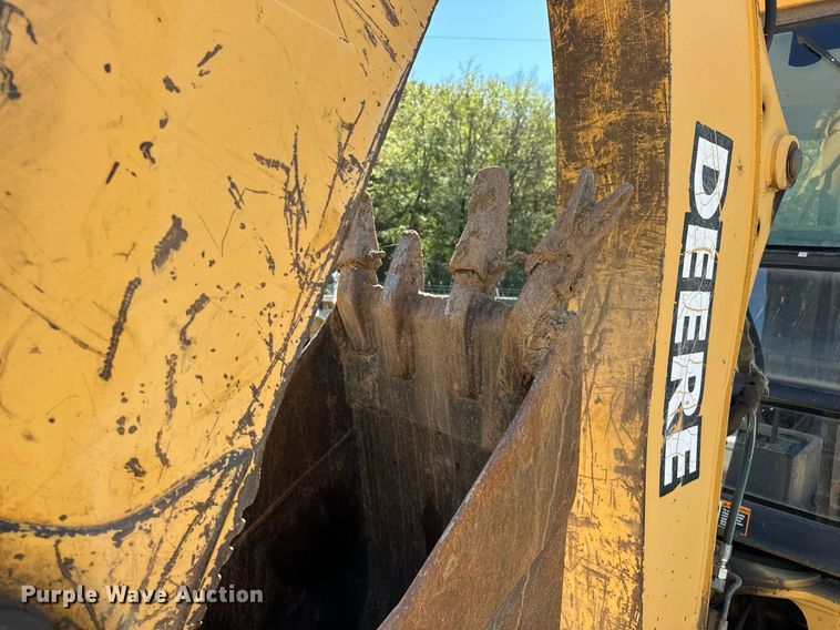 image for item EJ4879 1998 John Deere 310SE backhoe