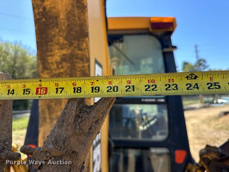 image for item EJ4879 1998 John Deere 310SE backhoe