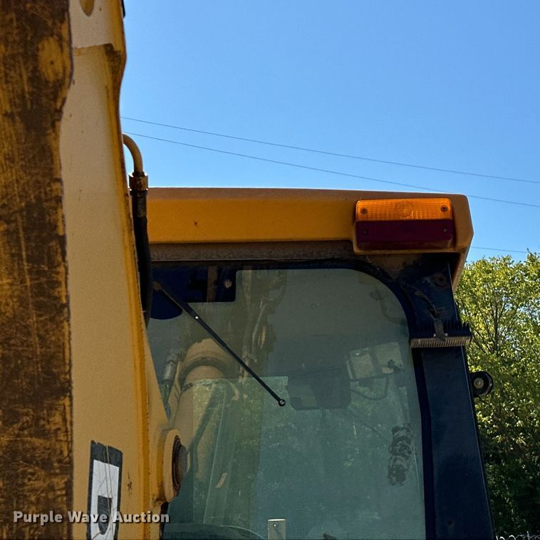 image for item EJ4879 1998 John Deere 310SE backhoe