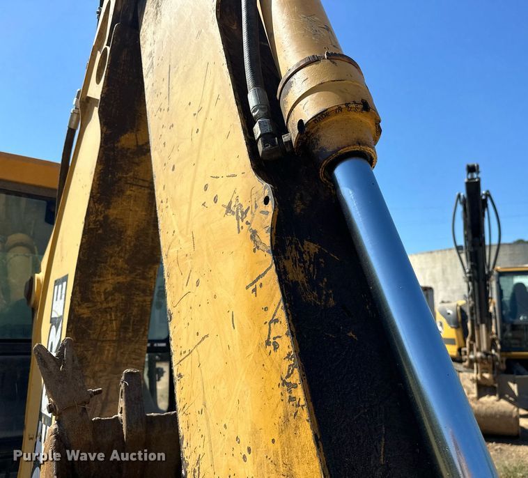 image for item EJ4879 1998 John Deere 310SE backhoe