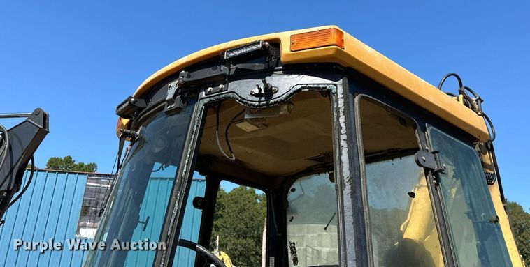 image for item EJ4879 1998 John Deere 310SE backhoe