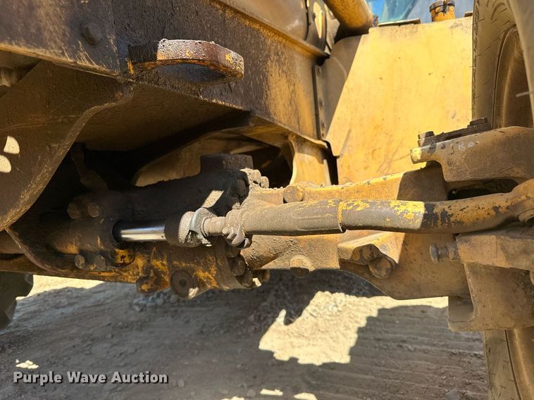 image for item EJ4879 1998 John Deere 310SE backhoe