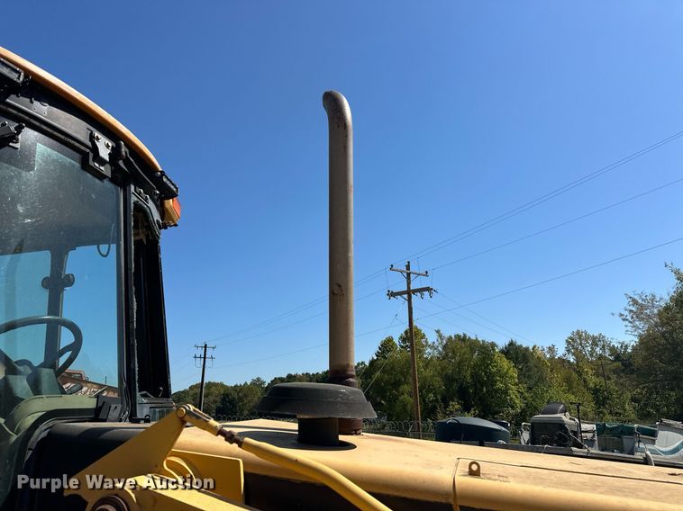 image for item EJ4879 1998 John Deere 310SE backhoe