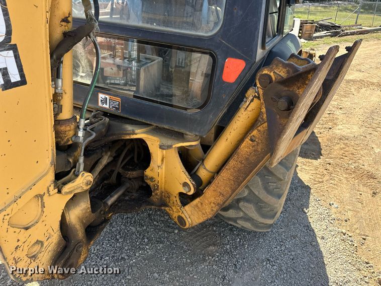 image for item EJ4879 1998 John Deere 310SE backhoe