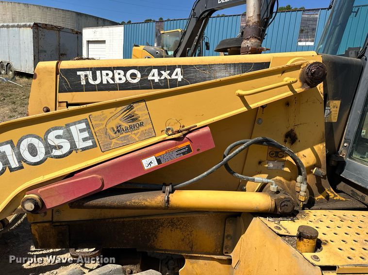 image for item EJ4879 1998 John Deere 310SE backhoe