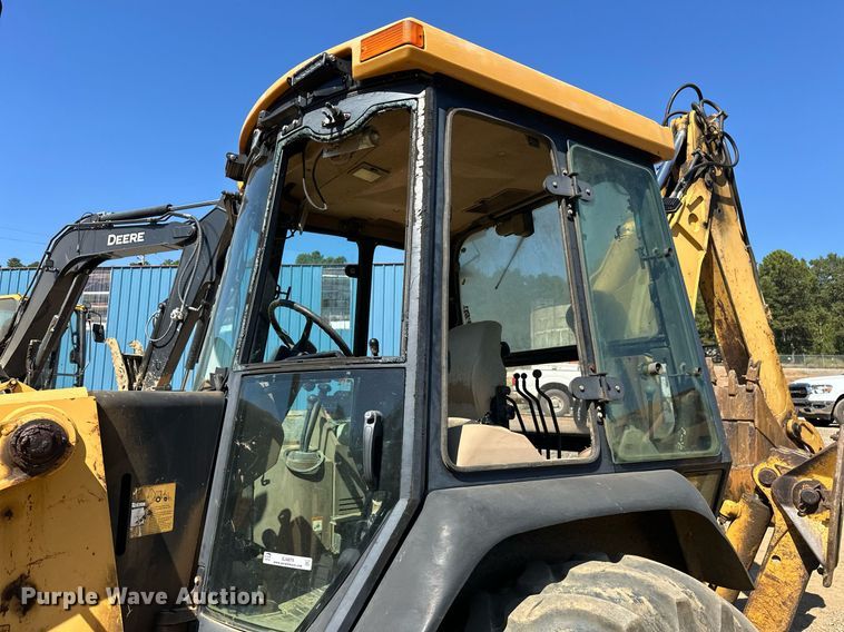 image for item EJ4879 1998 John Deere 310SE backhoe