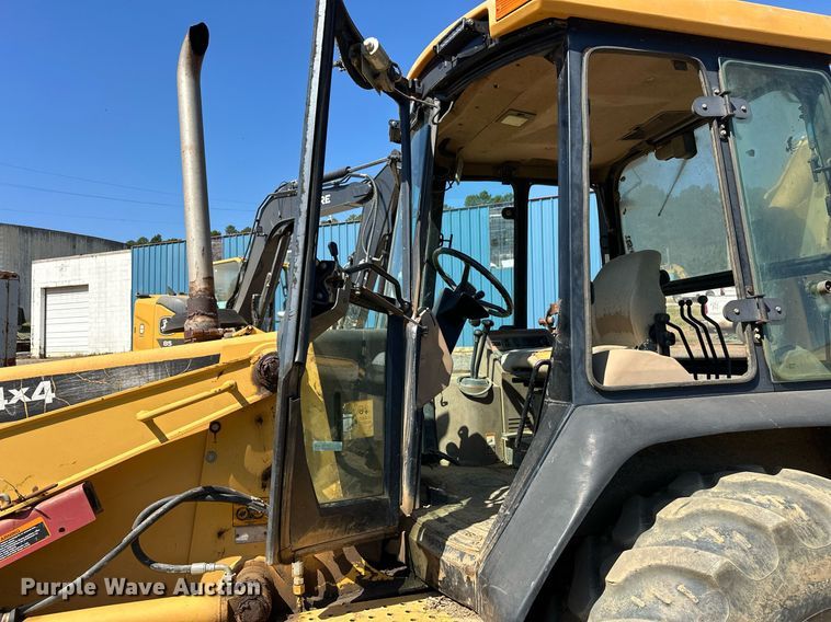 image for item EJ4879 1998 John Deere 310SE backhoe