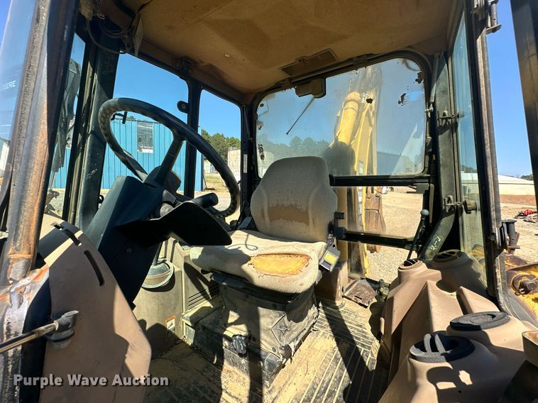 image for item EJ4879 1998 John Deere 310SE backhoe