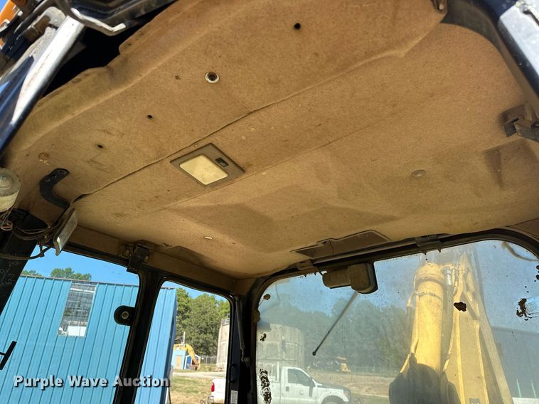 image for item EJ4879 1998 John Deere 310SE backhoe