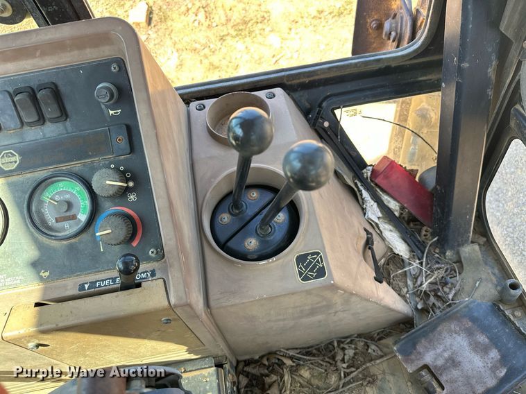 image for item EJ4879 1998 John Deere 310SE backhoe