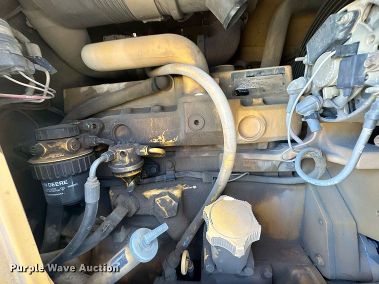 image for item EJ4879 1998 John Deere 310SE backhoe