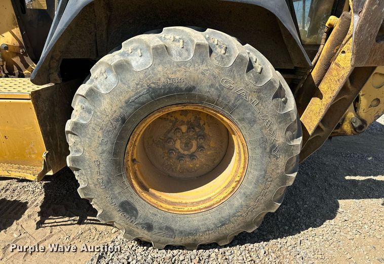 image for item EJ4879 1998 John Deere 310SE backhoe