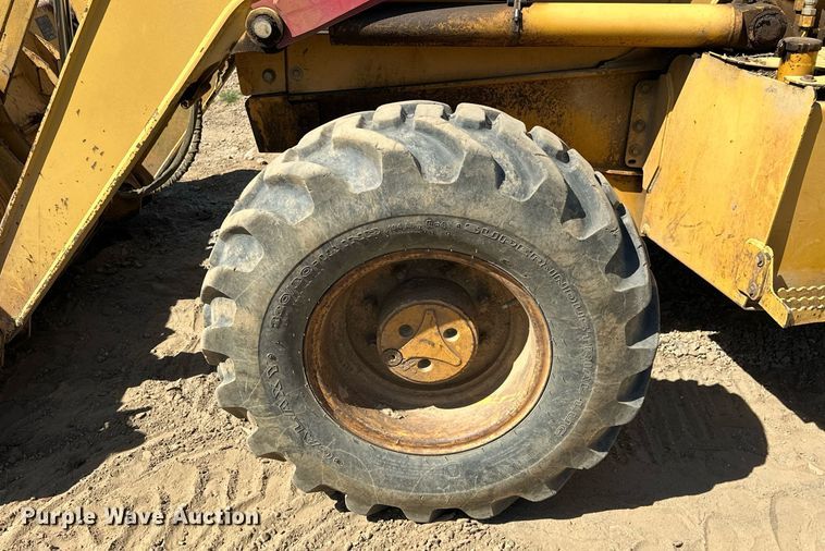 image for item EJ4879 1998 John Deere 310SE backhoe