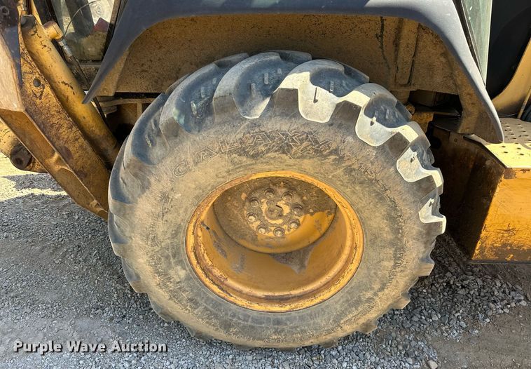 image for item EJ4879 1998 John Deere 310SE backhoe