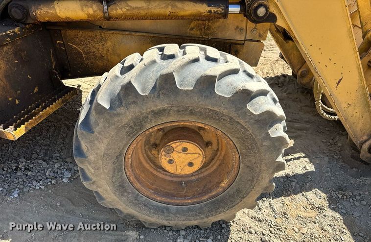 image for item EJ4879 1998 John Deere 310SE backhoe