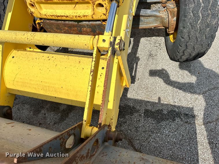 image for item EK0044 2004 New Holland LB75B backhoe