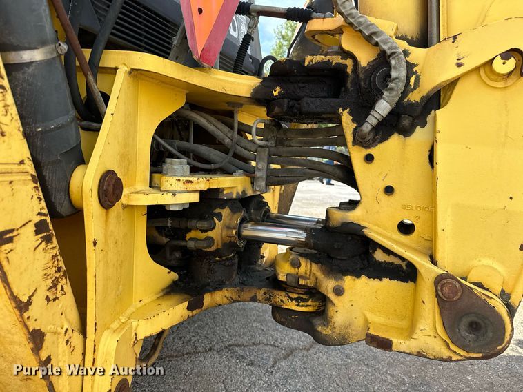 image for item EK0044 2004 New Holland LB75B backhoe
