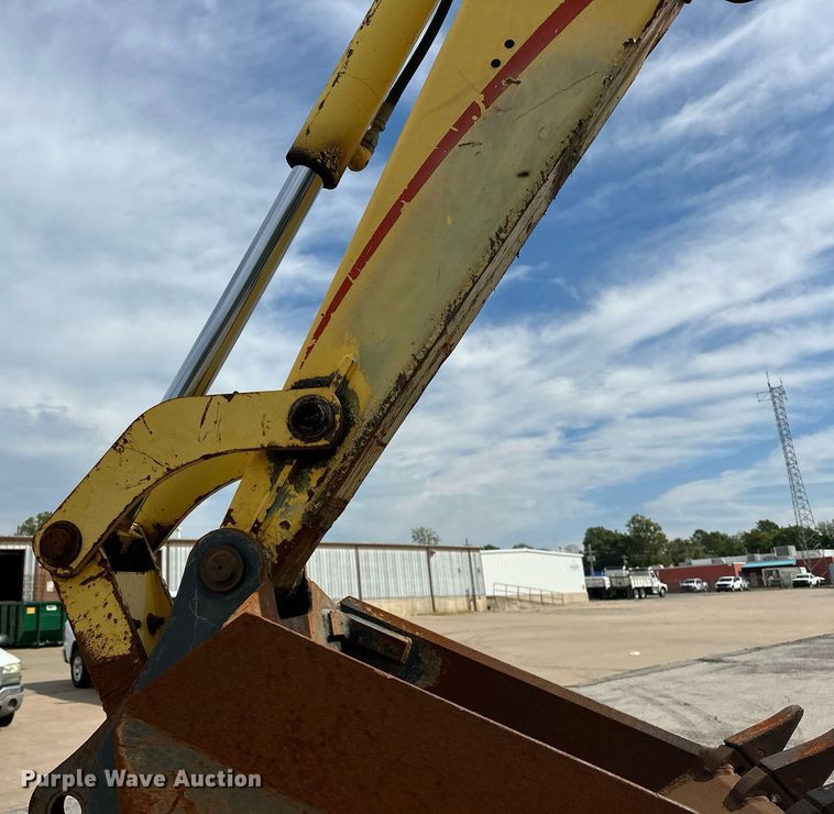 image for item EK0044 2004 New Holland LB75B backhoe