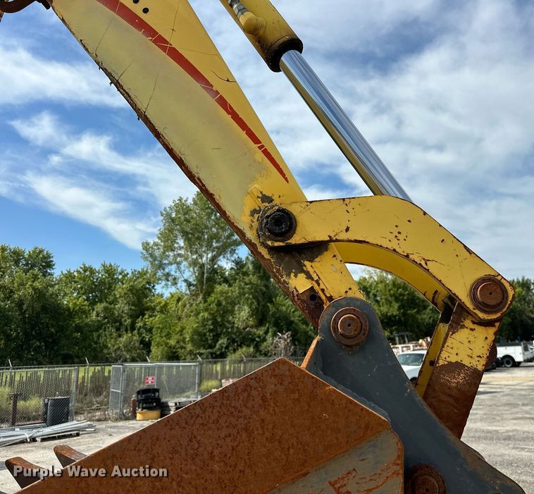 image for item EK0044 2004 New Holland LB75B backhoe