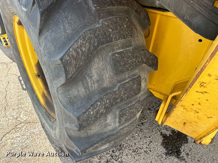 image for item EK0044 2004 New Holland LB75B backhoe