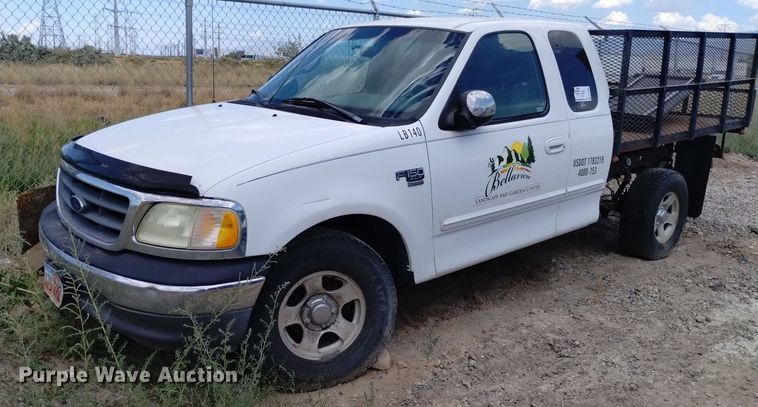 image for item DP3362 2002 Ford F150 XLT SuperCab flatbed pickup truck