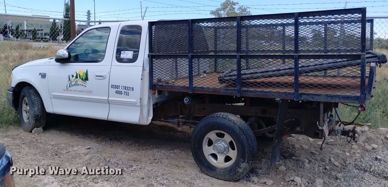 image for item DP3362 2002 Ford F150 XLT SuperCab flatbed pickup truck