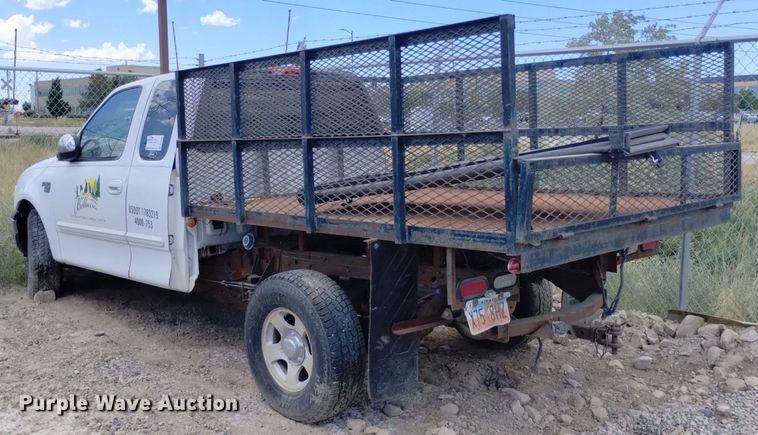 image for item DP3362 2002 Ford F150 XLT SuperCab flatbed pickup truck