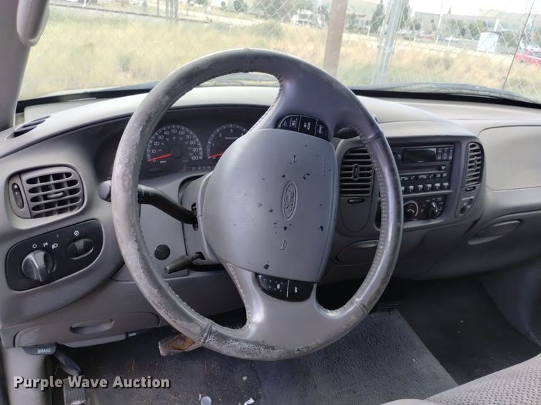 image for item DP3362 2002 Ford F150 XLT SuperCab flatbed pickup truck