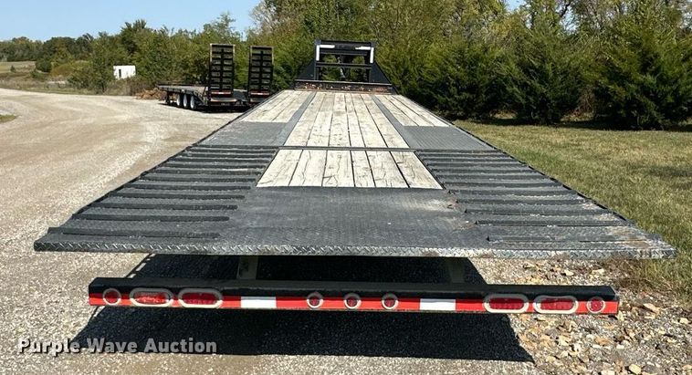 image for item EN0045 2015 Load Trail 36 Flatbed hydraulic tail equipment trailer