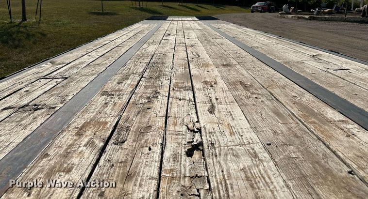 image for item EN0045 2015 Load Trail 36 Flatbed hydraulic tail equipment trailer