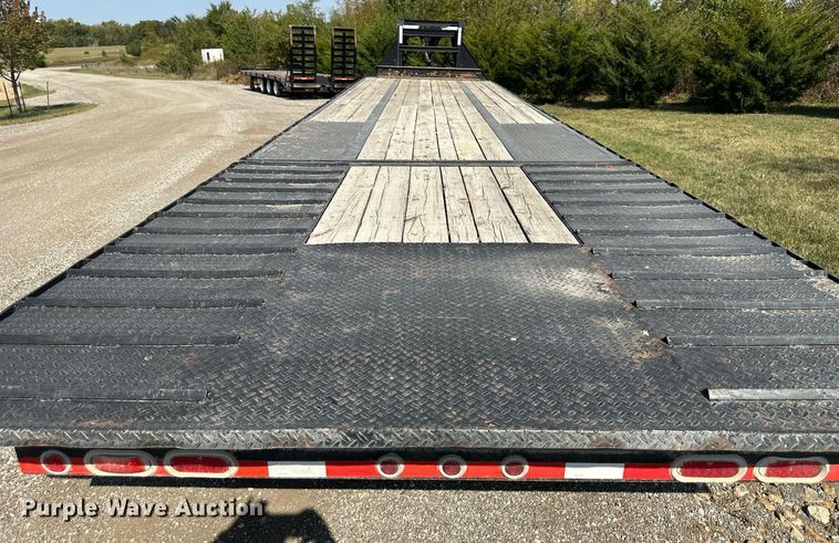 image for item EN0045 2015 Load Trail 36 Flatbed hydraulic tail equipment trailer