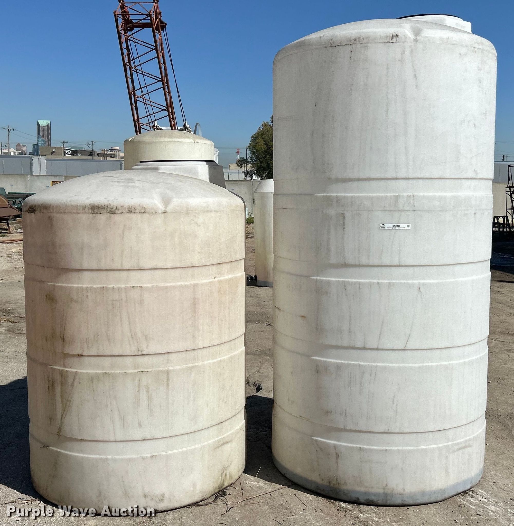 (2) poly tanks in St. Louis, MO | Item EK3538 sold | Purple Wave