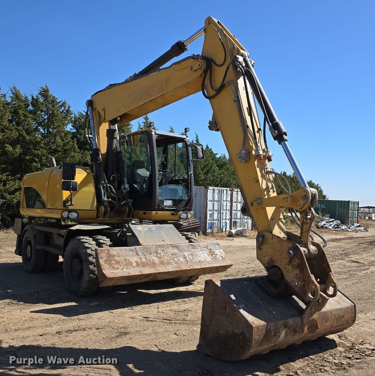 image for item DW3761 2010 Caterpillar M316D wheeled excavator