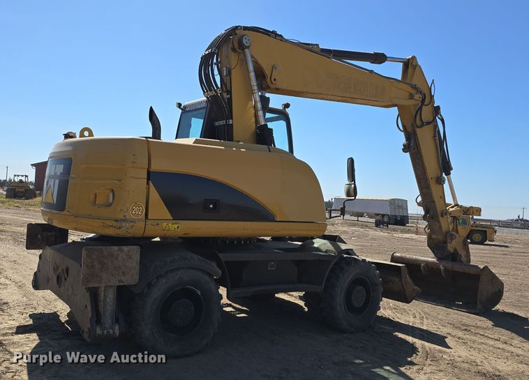 image for item DW3761 2010 Caterpillar M316D wheeled excavator
