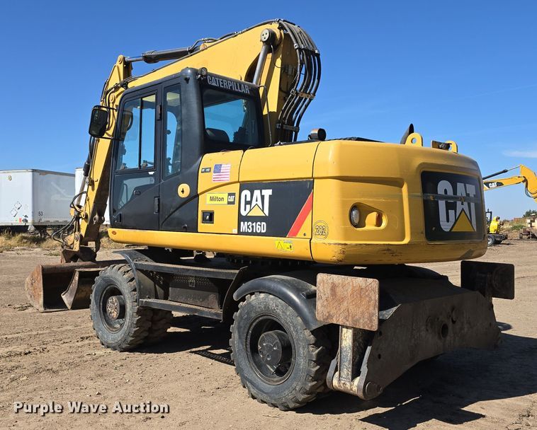 image for item DW3761 2010 Caterpillar M316D wheeled excavator
