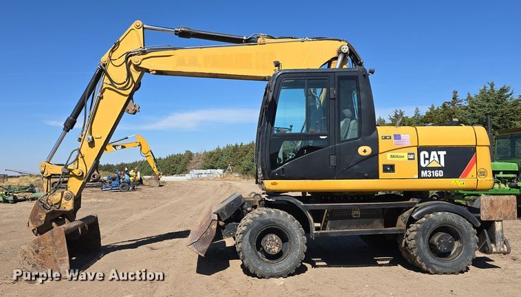 image for item DW3761 2010 Caterpillar M316D wheeled excavator