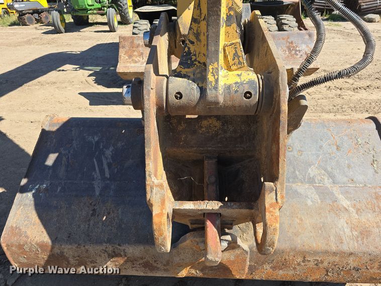 image for item DW3761 2010 Caterpillar M316D wheeled excavator