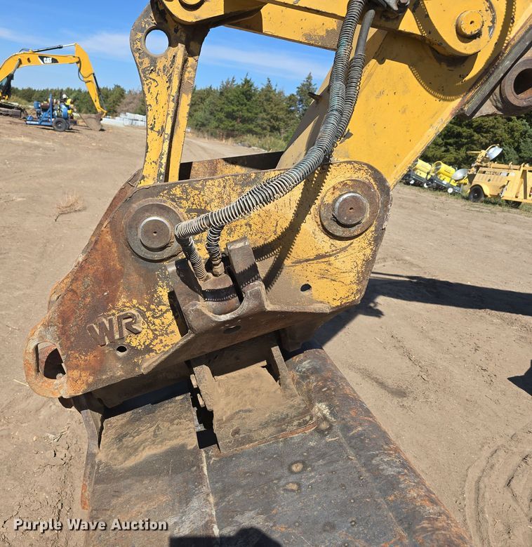 image for item DW3761 2010 Caterpillar M316D wheeled excavator