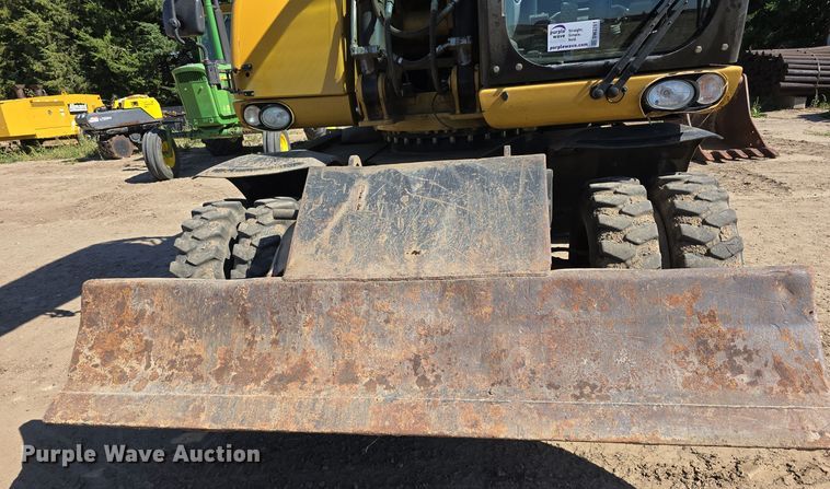 image for item DW3761 2010 Caterpillar M316D wheeled excavator