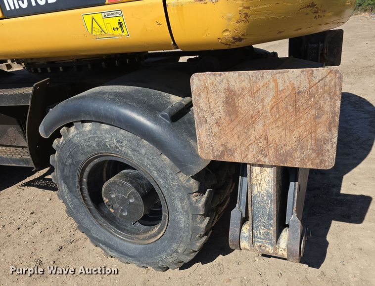 image for item DW3761 2010 Caterpillar M316D wheeled excavator