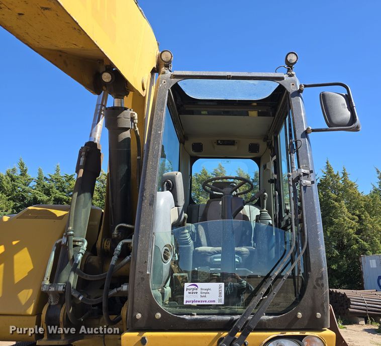 image for item DW3761 2010 Caterpillar M316D wheeled excavator