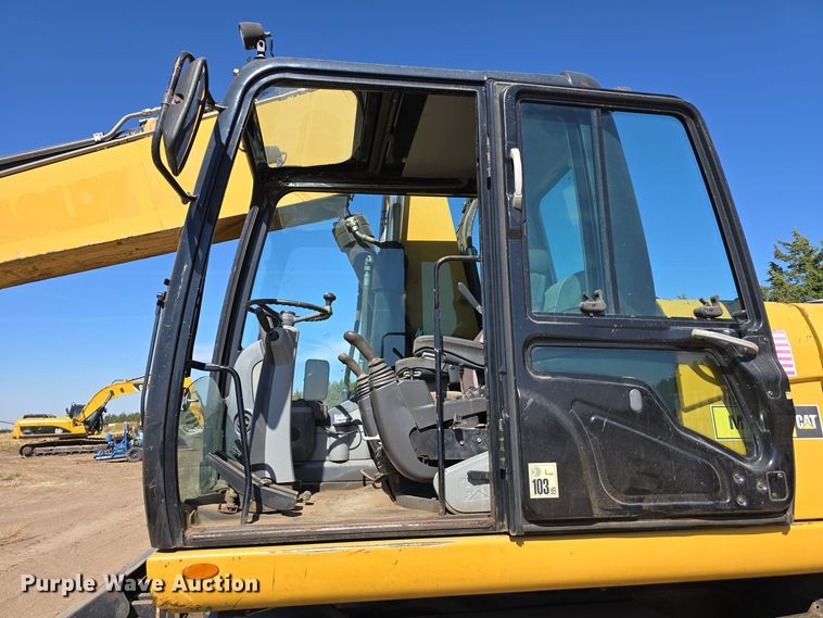 image for item DW3761 2010 Caterpillar M316D wheeled excavator