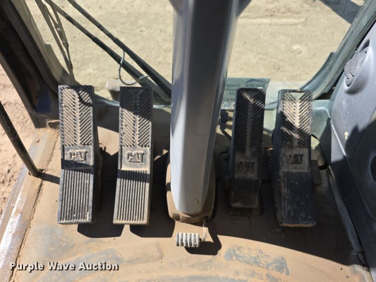 image for item DW3761 2010 Caterpillar M316D wheeled excavator