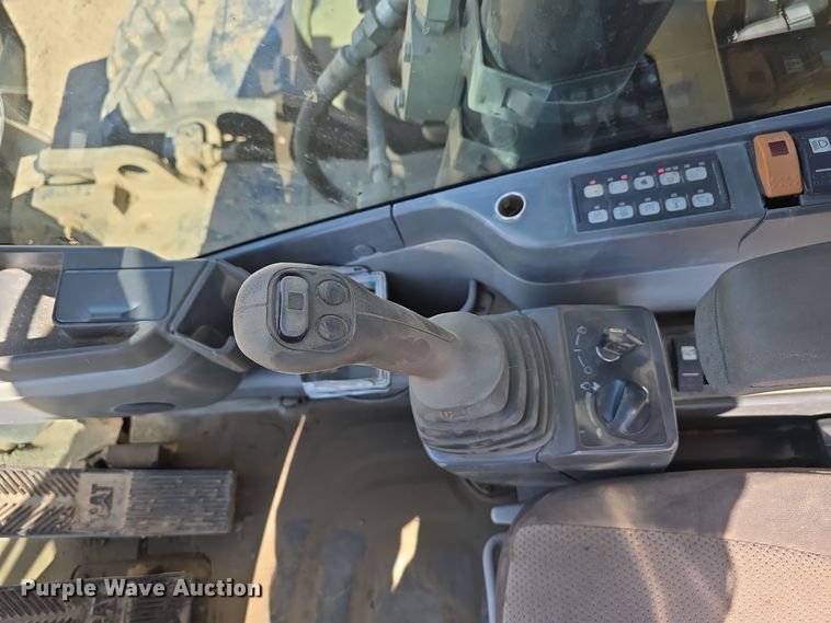 image for item DW3761 2010 Caterpillar M316D wheeled excavator