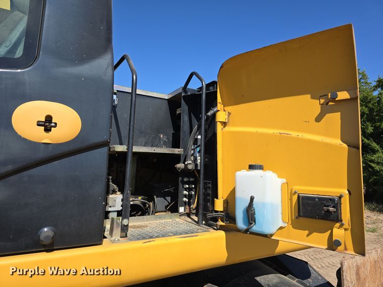 image for item DW3761 2010 Caterpillar M316D wheeled excavator