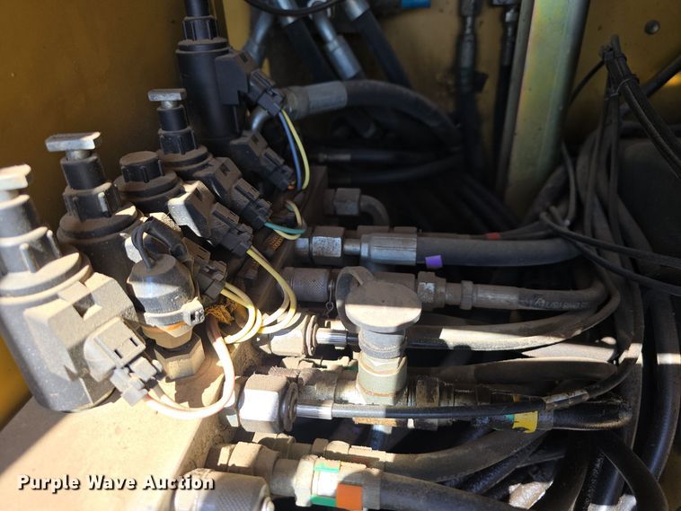 image for item DW3761 2010 Caterpillar M316D wheeled excavator